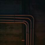 Copper pipework and fittings on a wall