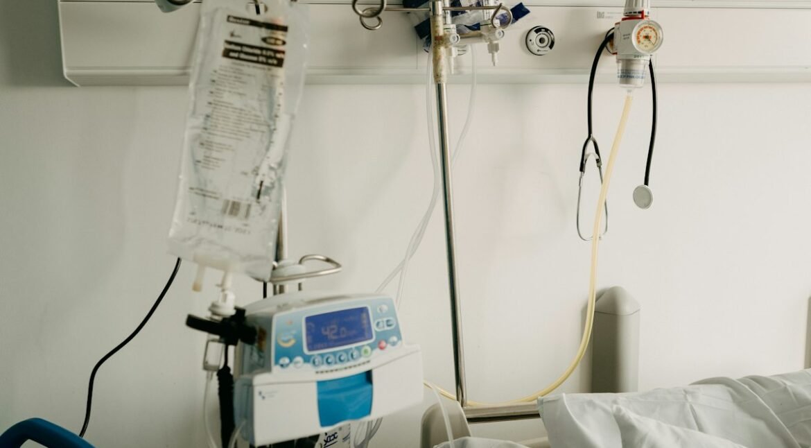 Hospital room with bed and medical gas equipment