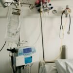Hospital room with bed and medical gas equipment