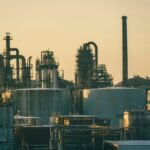Refinery with storage tanks and pipework