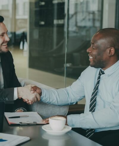 Two business people shaking hands